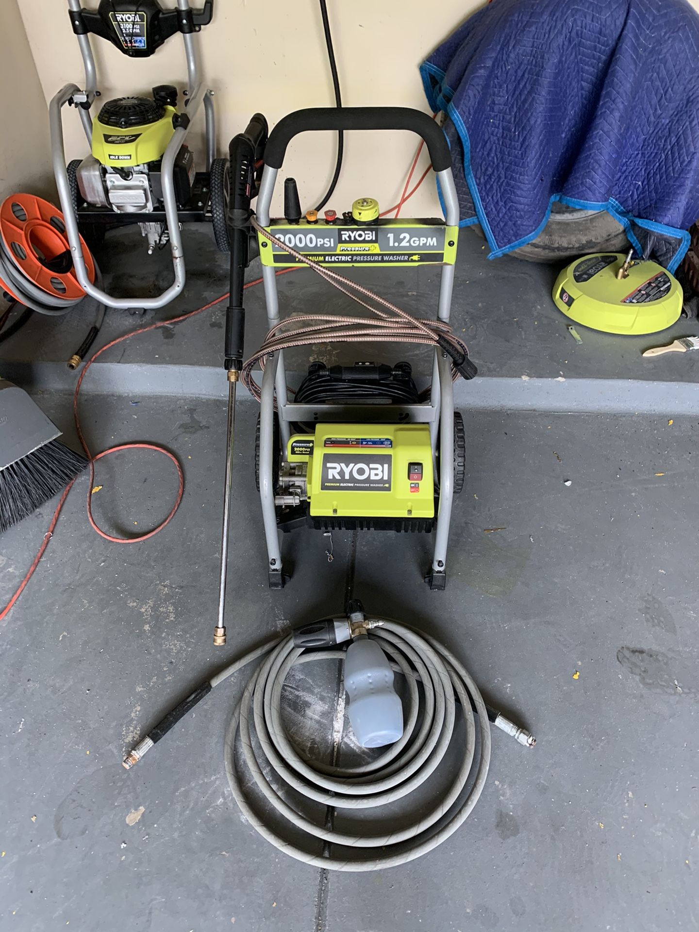 RYOBI electric pressure washer and accessories.