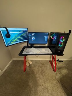 pc, monitors, table, mouse, key keyboard, and mouse pad,