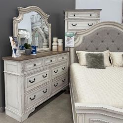 Realyn Chipped White Upholstered Panel Bedroom Set
