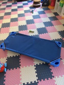 Children's dining table, chair, crib, and toys