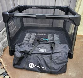 Pack and Play (4MOMS) pop up bed and play area