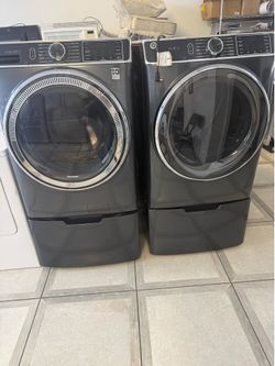 Ge front load washer and gas dryer set