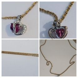 Small heart shaped pendant with red stone and 25" chain