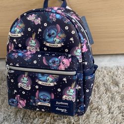 Disney Loungefly Lilo & Stitch Mini Backpack Flipped Disney Label Collector’s Item. 