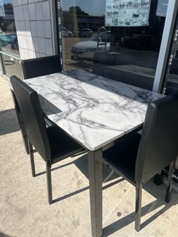 Furniture table with four chair