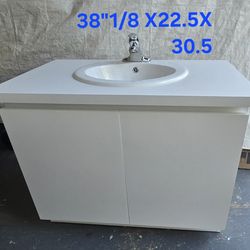 Bathroom  cabinet with sink, faucet,countertop, plombling