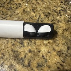 Playstation Earbuds With A Ps Five And A Playstation Portal