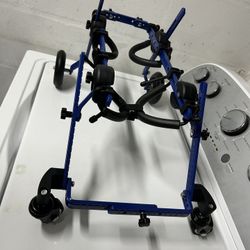 Walkin’ Wheels Small Dog Wheelchair includes front wheel attachment. 