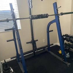 Commercial Grade  Nautilus Home gym, Power Rack Squat rack, lat pull high low.    