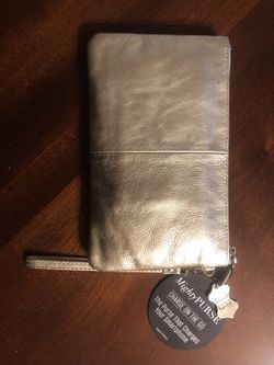 Mighty Purse leather clutch with charger