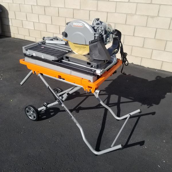 Brand New Heavy Duty RIDGID 10 in. Wet Tile Saw with Stand for Sale in