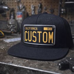 Custom license plate–style plaque hat with a classic old-school look.