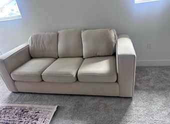 Beautiful cream colored sofa couch