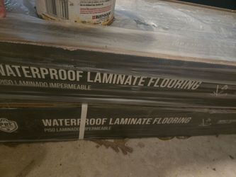 Waterproof laminate flooring