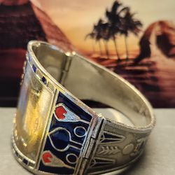 #2136, EXQUISITE EGYPTIAN REVIVAL ENAMELED SCARAB BRACELET, SLIDING BAR CLOSURE.
