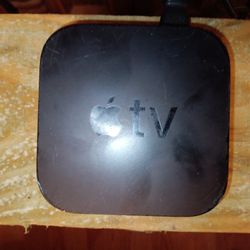 Apple{T.V.}streaming device module/brain