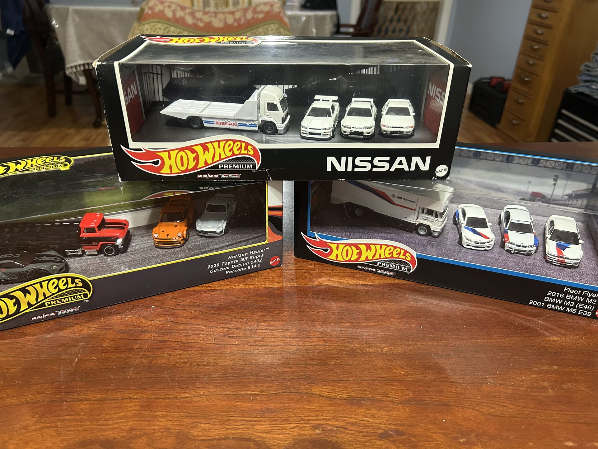 Hot Wheels Premium Collector Display Sets, 3 Cars & 1 Transporter