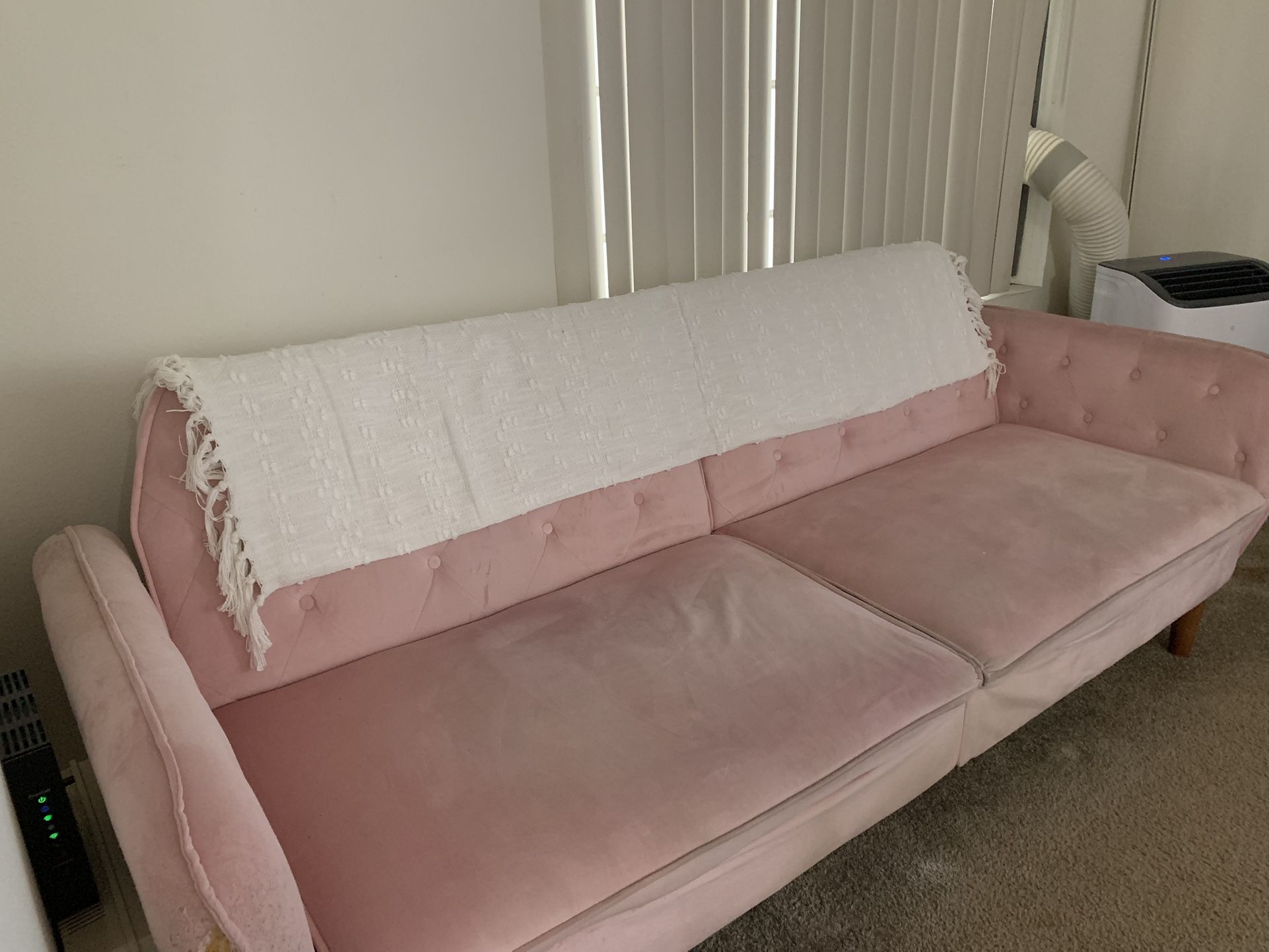 PINK FUTON COUCH