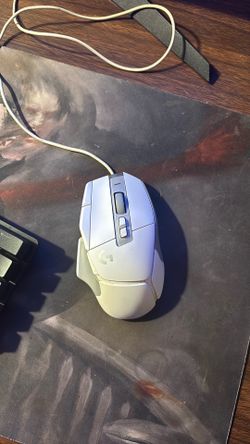 Logitech G502X mouse and a mouse pad Logitech G502X mouse and a mouse pad