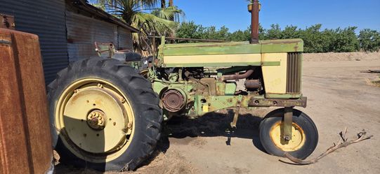 1958 John Deere 720 Row Crop Single Front Wheel Tractor