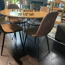 Dining Table and 4 brand new chairs