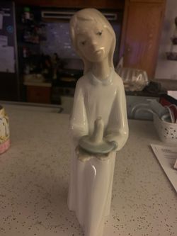 Porcelain Boy with Candle Figurine