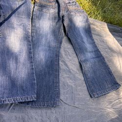 Jeans one pair is new. It’s Leesor Levi’s. I’m not sure which one I have is a  I have is a fleece lined for Winter excellent condition size 5 girls.