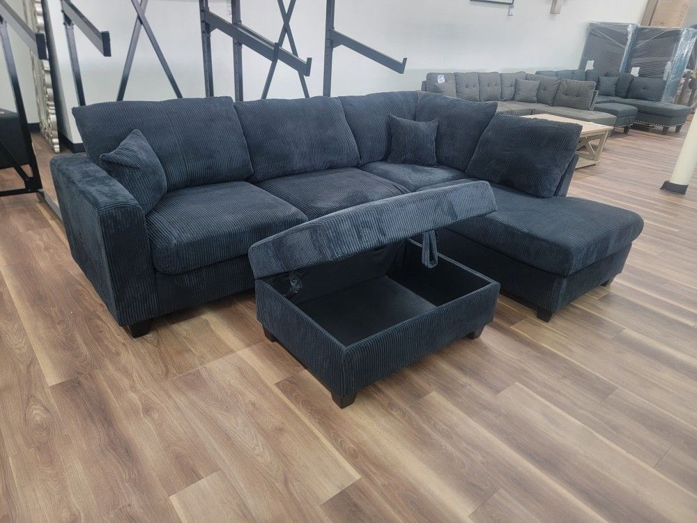 New 2pc Sectional In Black Corduroy Plus Storage Ottoman