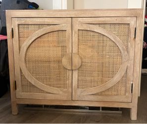 Two-Door Cane Cabinet with Circle Detail