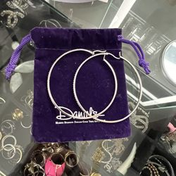 Daniel’s Jewelers silver hoop earrings 