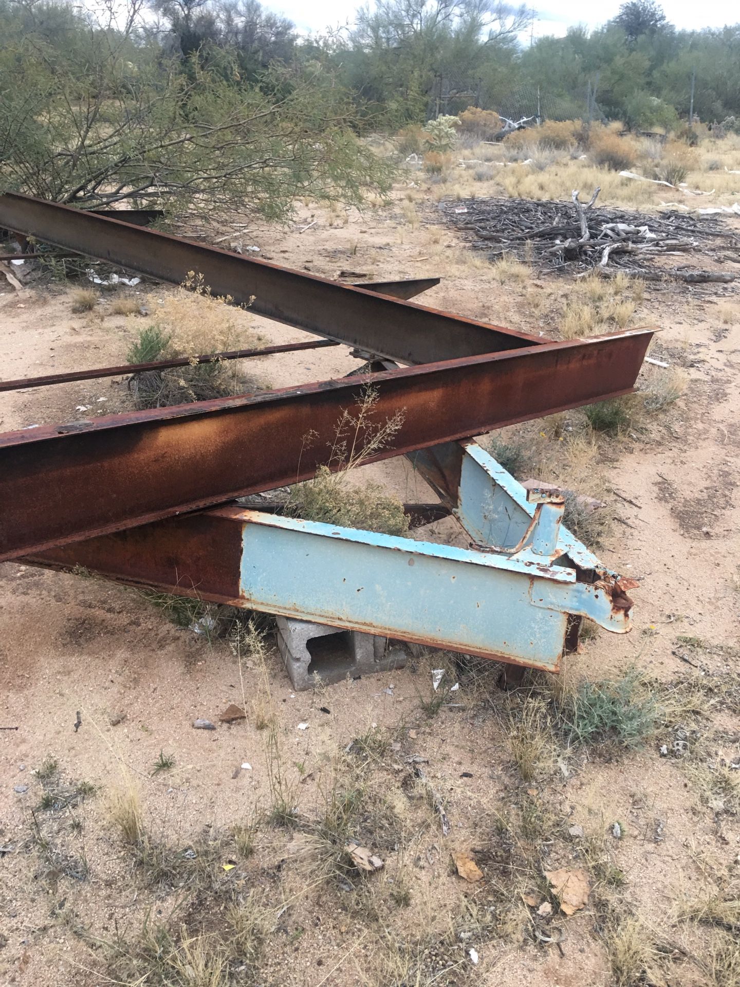 Mobile home frame with three axles and tires