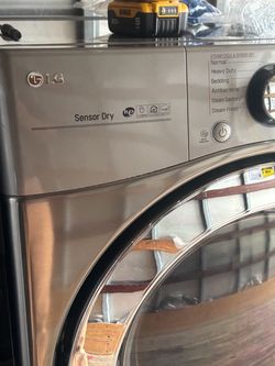 Front load dryer with pedestal