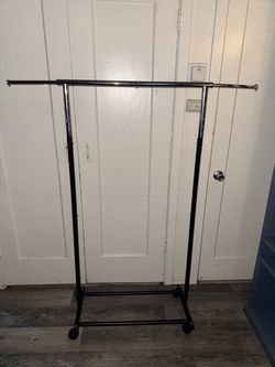 Simple rolling clothing rack
