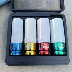 Titan 4-piece non-marring 1/2-inch drive lug nut socket set.  