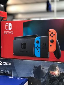 Nintendo Switch with Neon Blue and Neon Red Joy-Con