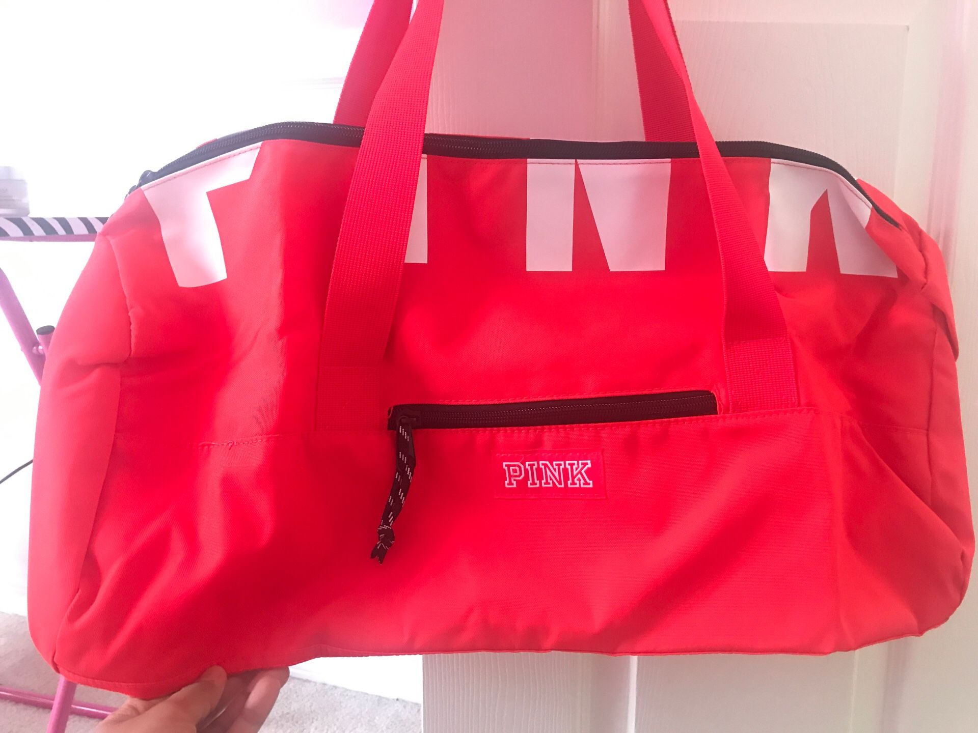 Pink duffle bag