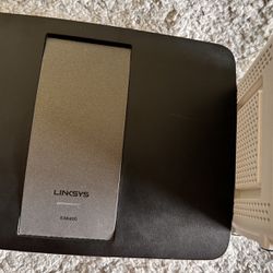 Linksys And Arris Surfboard - Wifi Router And Modem 