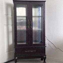 Armoire display cabinet with built-in lighting