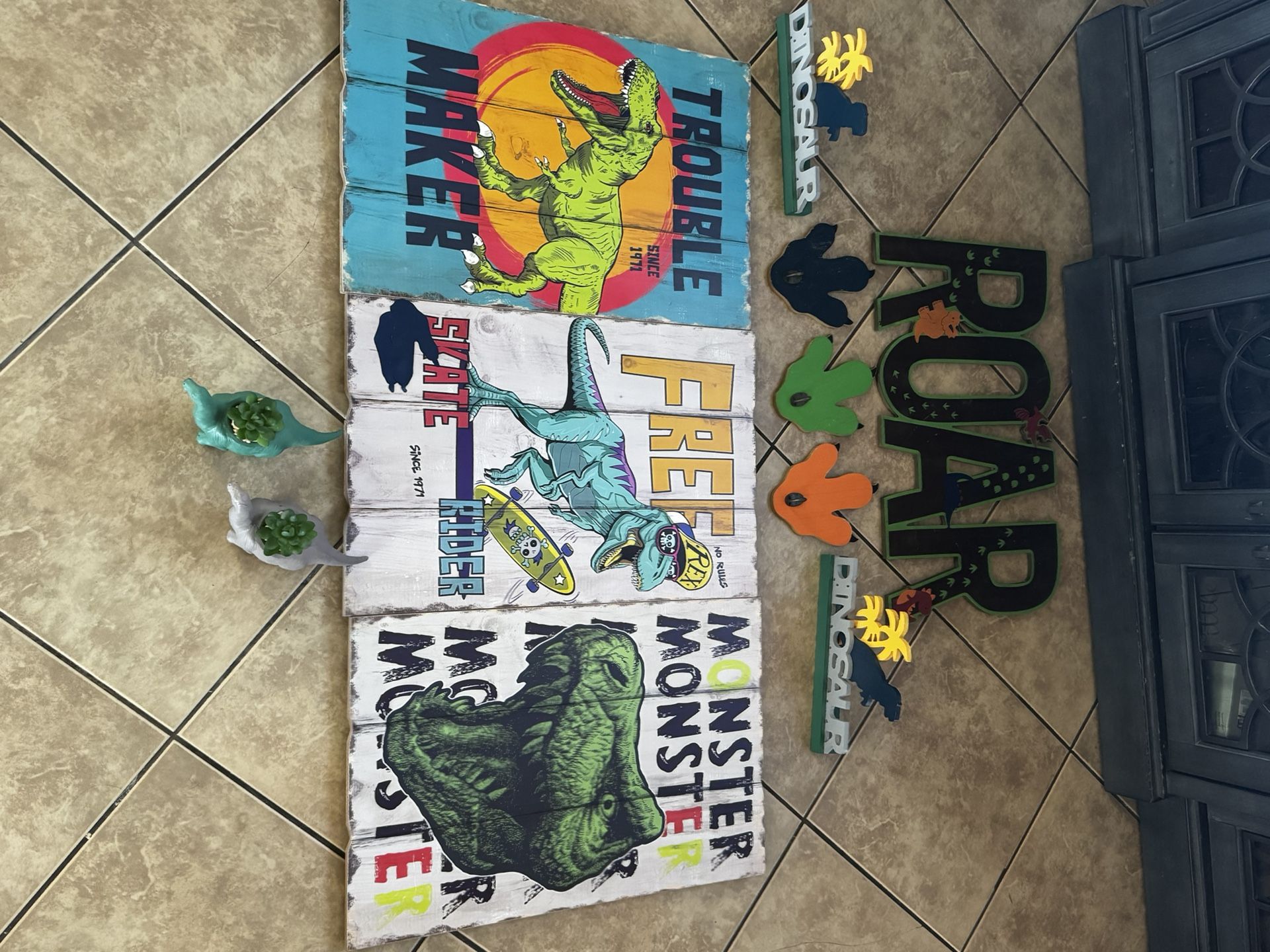 Dinosaur Signs, Hangers, And Fake Plants