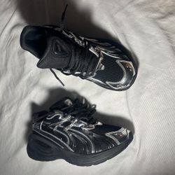 Black and Silver Puma Inverse.