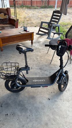 Caroma sit down e-scooter