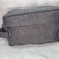 Grey and silver wash bag with zipper closure and small front pocket  #travelbag 