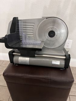 MEAT SLICER $ 100.00