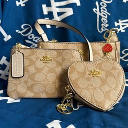 Coach purse 3 and 1