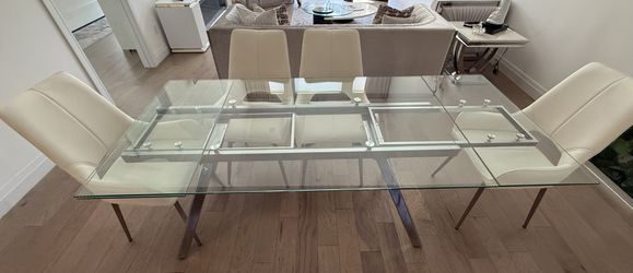 Glass and metal dining table