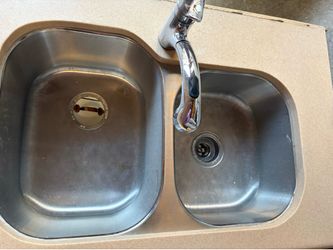 Double stainless steel sink with faucet