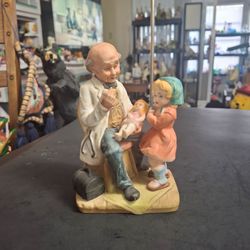 Bisque Porcelain Hand-painted Figurine Of A Doctor Pediatrician With A Child & Doll, Whimsical 6.25"H X 4.5"W