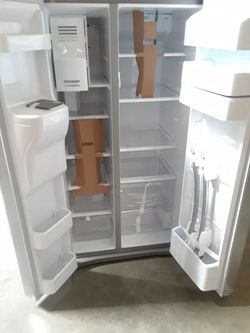Side by side refrigerator New 6month warranty