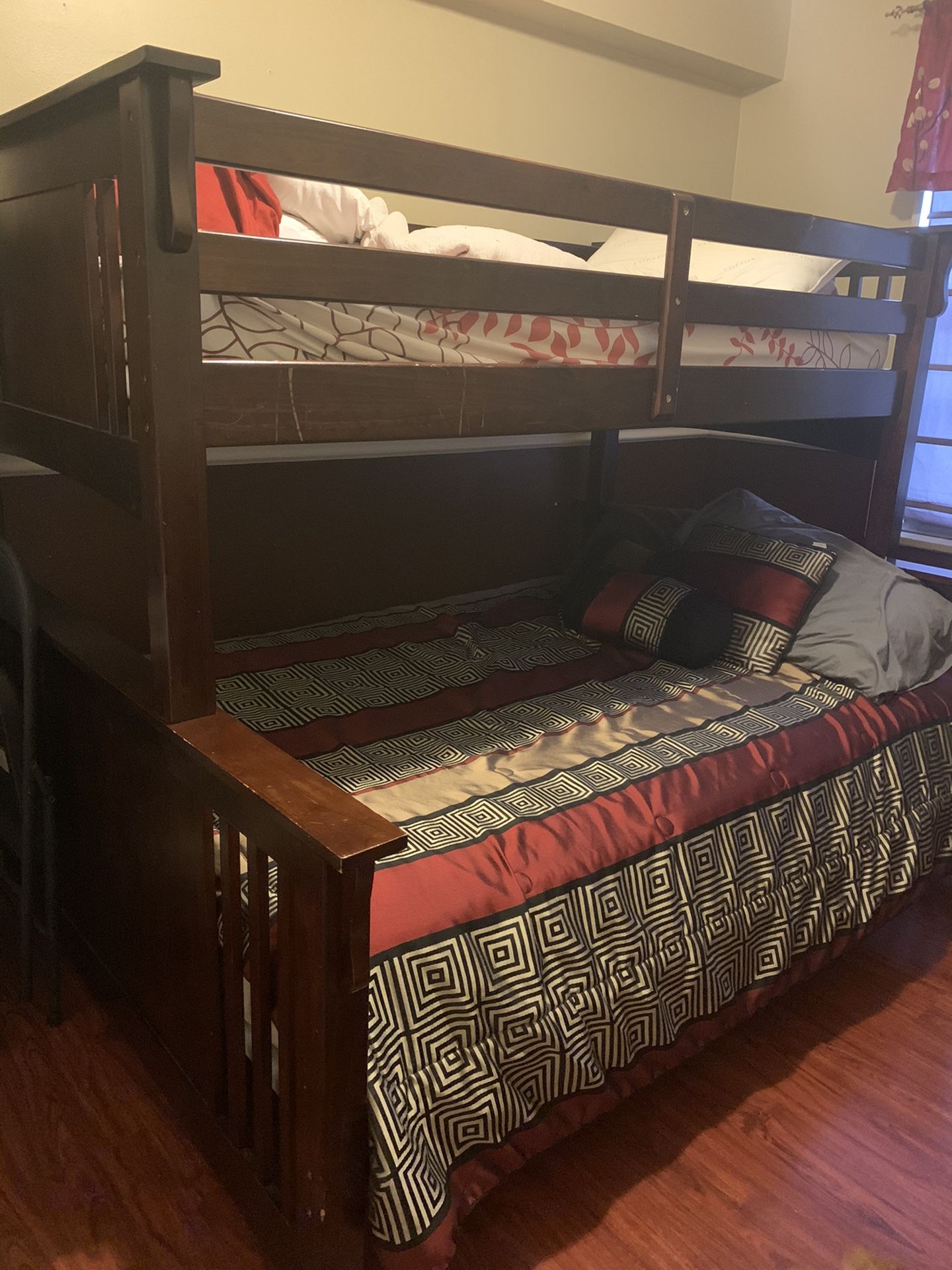 Bunk bed with a full size on bottom and a twin size on top.