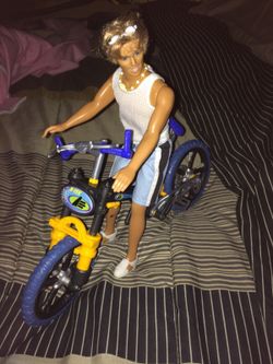 Ken doll with mountain bike
